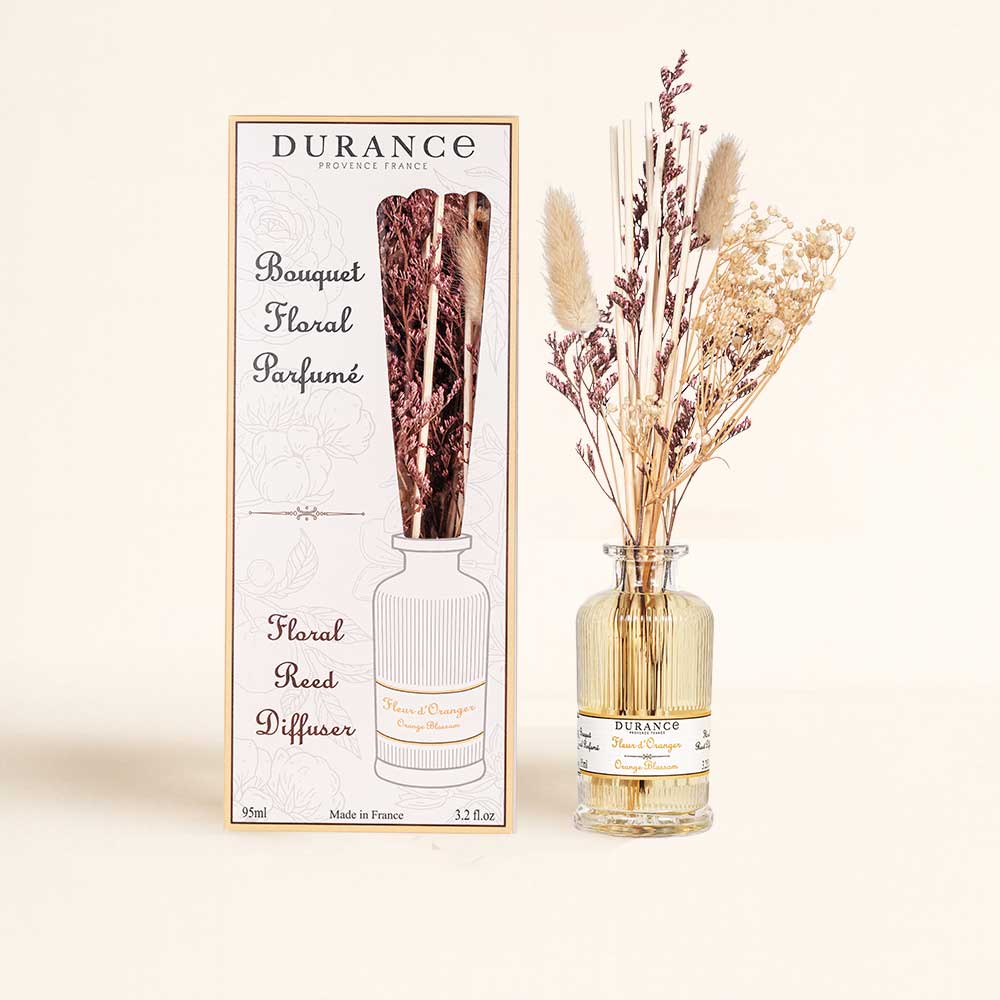 Ambientador mikado con flores secas Flor de Azahar de 95ml junto a su caja original botánica de Durance, perfecto para regalo.