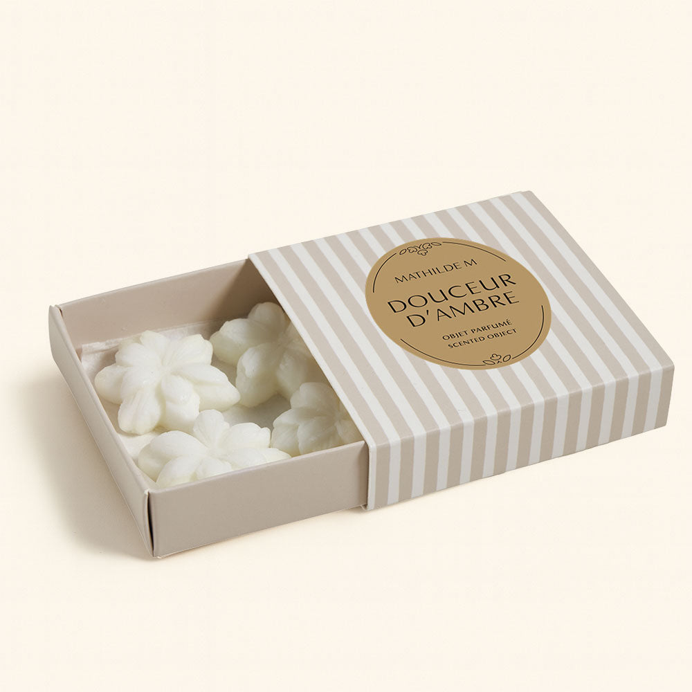 Ceras perfumadas Douceur D Ambre: Misterio y sensualidad en tu quemador. 4 ceras que perfuman hasta 4h cada una. ¡Haz clic y déjate envolver!