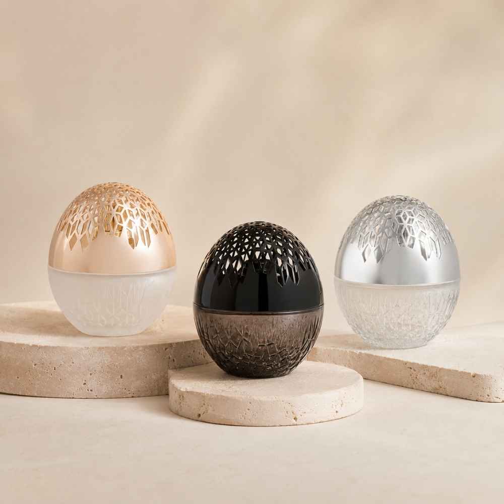 Colección Luka Maison Berger completa, lámparas catalíticas en acabado Escarchada, Negra y Transparente reunidas sobre piedra clara – D'Arome