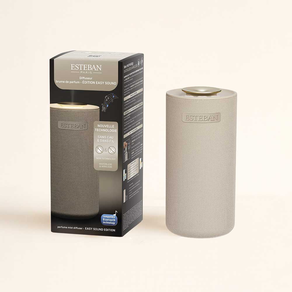 Difusor de aromas Easy Sound Esteban Paris con altavoz incorporado sin agua, apagado, junto a su caja – D'Arome
