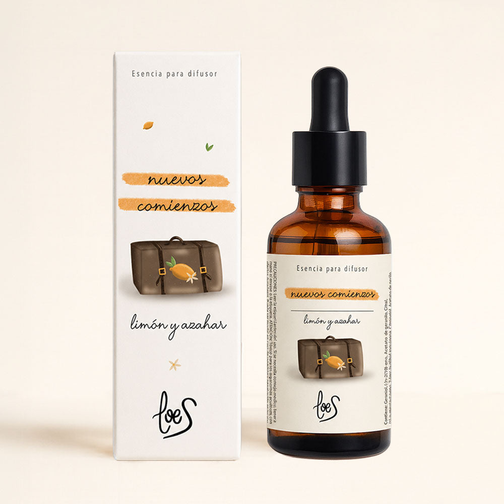 Esencia para difusor Nuevos Comienzos LoeS aroma limón y azahar, frasco con pipeta y caja producto, vista frontal fondo neutro – D'Arome