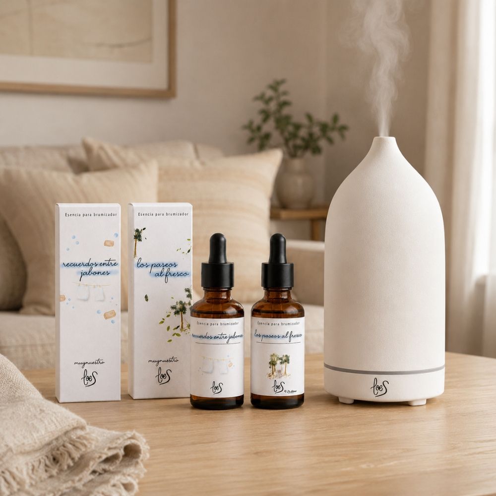 ack duo de esencias de hogar Loes D'Arome con brumizador encendido soltando vapor en un salón de estética natural.