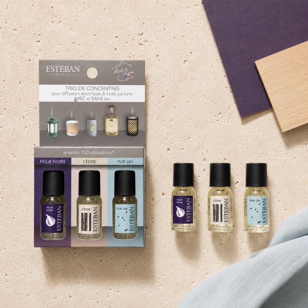 Vista cenital del pack trío de concentrado de perfume Figue Noire, Cèdre y Pur Lin Esteban París con su caja original – D'Arome