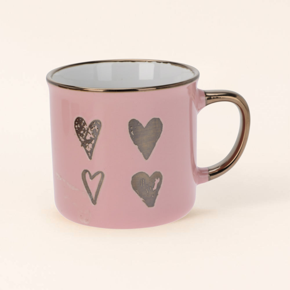 La Taza Cuatro Latidos Rosa Claro late con amor y dulzura. 💗 Cuatro corazones dorados para empezar el día con calma, café y un toque de amor.