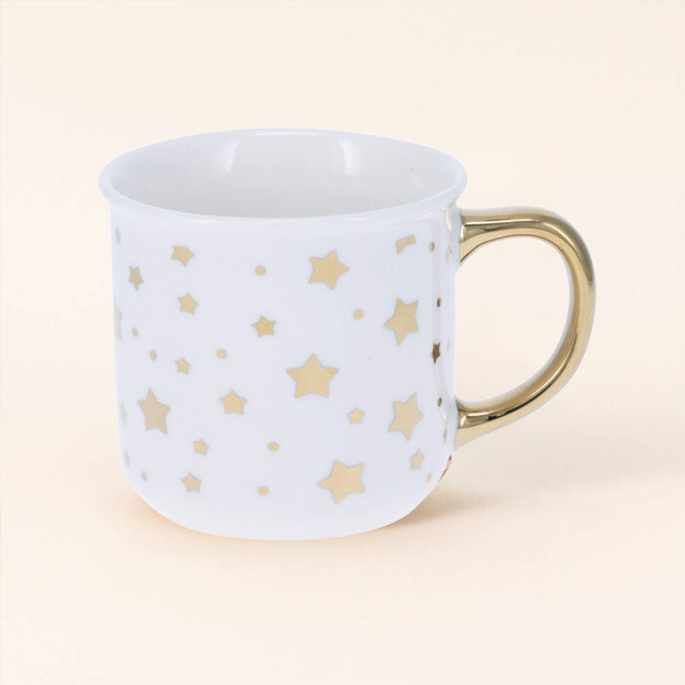 Taza Estrella de Navidad blanca y dorada (320 ml). Perfecta para disfrutar de tus infusiones y cafés navideños. Para regalar o autoregalártela.