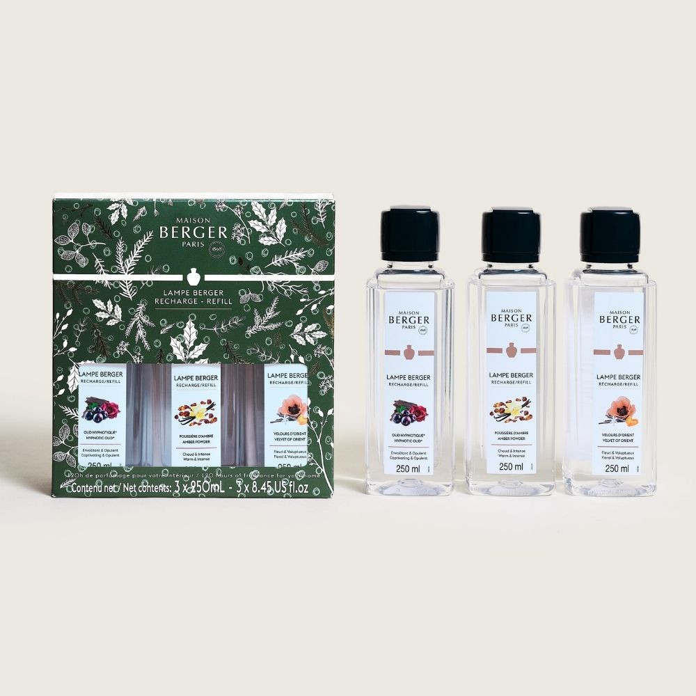 Trío pack Magical Maison Berger con caja verde navideña junto a los tres recambios de líquido para Lampe Berger 250ml Oud Hypnotique, Amber Powder y Velvet of Orient – D'Arome