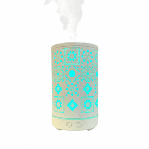 Difusor de perfume Mosaico de LoeS con luz encendida en color azul y en funcionamiento