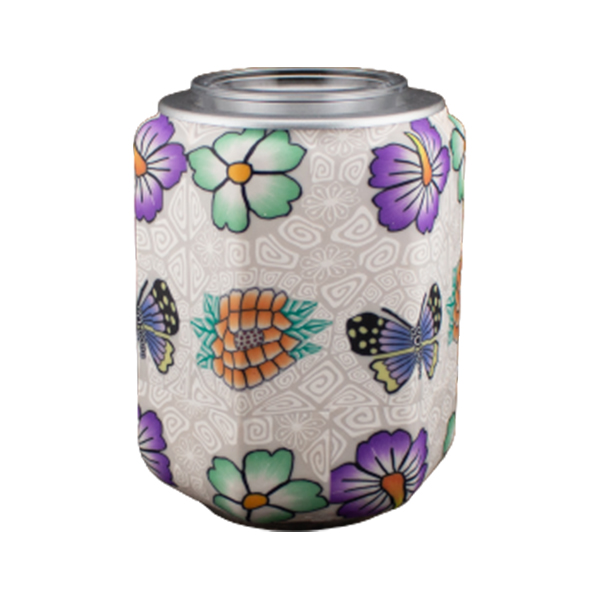 Quemador eléctrico primavera con un diseño que contiene flores y mariposas de colores en D'Arome