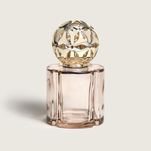 Descubre la lámpara catalítica Pomelis Nude de Maison Berger. Una joya en tono nude elegante. Aroma Splendeur Vanillée incluido. ¡Enamórate!