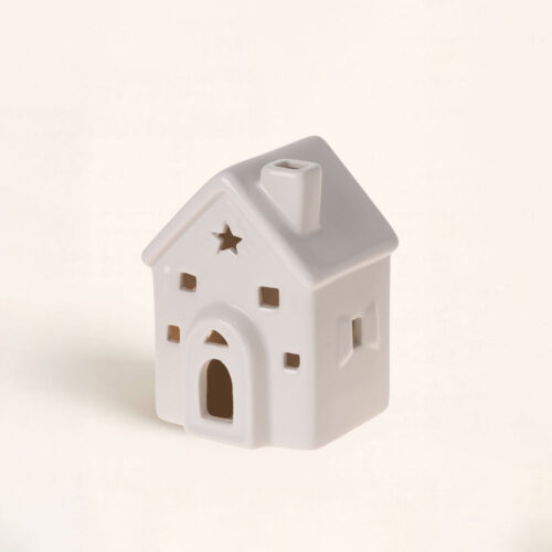 Casita con Luz Estrella. Es cerámica de 8cm y con ventana en forma de estrella. Luz cálida para un hogar acogedor. Perfecta para Navidad. ¡Corre!