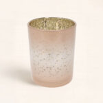 Portavelas Estrellas Rosa con reflejos dorados. Luz cálida y diseño romántico para decorar o regalar en Navidad. ¿Preparada para tu momento?