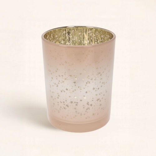Portavelas Estrellas Rosa con reflejos dorados. Luz cálida y diseño romántico para decorar o regalar en Navidad. ¿Preparada para tu momento?